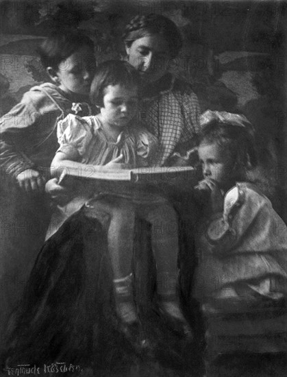 Woman and children reading