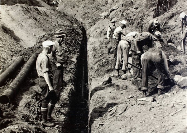 A crew works on the Wilson River Highway