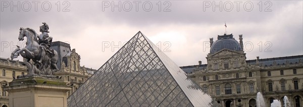exterior of the 'Louvre Pyramid' at the Louvre museum, Paris France