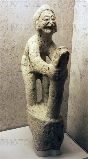 Limestone figure of an old man and boy Huaxtec