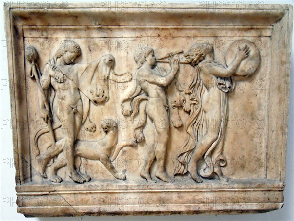 Marble relief of a maenad and two satyrs in a Dionysiac procession