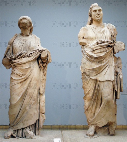 Colossal statue of a man and woman