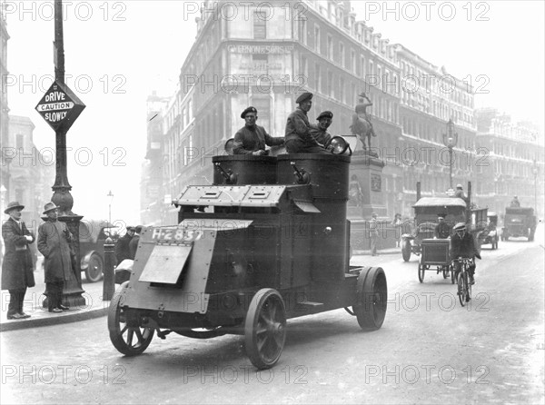 General Strike, Britain, 1926. Food convoy being escorted along Holborn,  London, by troops in armoured cars. Photograph.