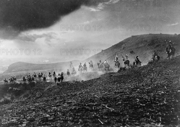 Group of Native Americans in war dress