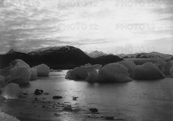 Photograph of large ice formations in water