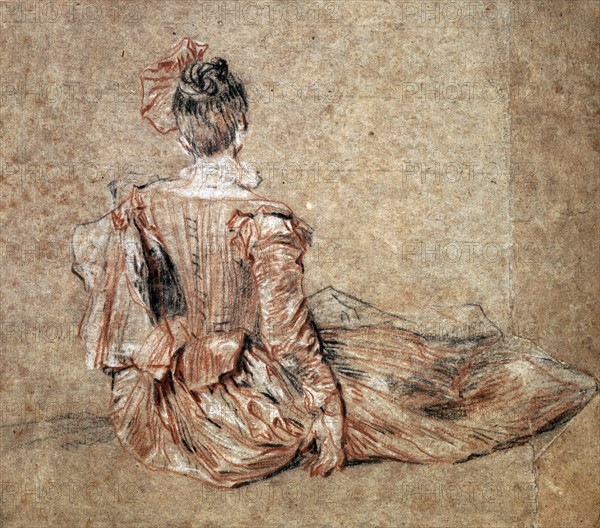 Seated woman viewed from the back