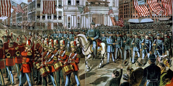 Union soldiers and band marching through a city street