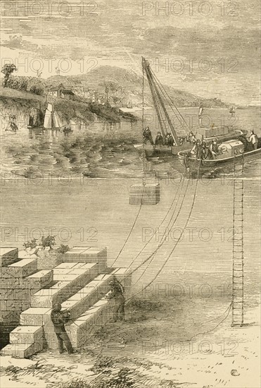 Divers building a breakwater