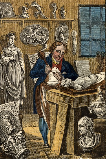 Sculptor carving a stone statue