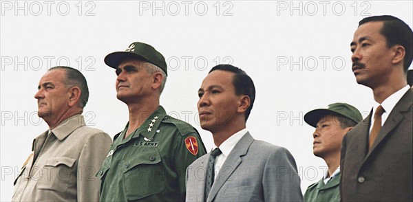 Left to right (front row) President Lyndon Johnson USA, General Westmorland (US commander in Vietnam), General Thieu Air Vice Marshall Ky of South Vietnam. 1967 or 1968