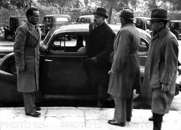 Dr Chair Weisman at the Office of the Royal Commission in his car 1936.