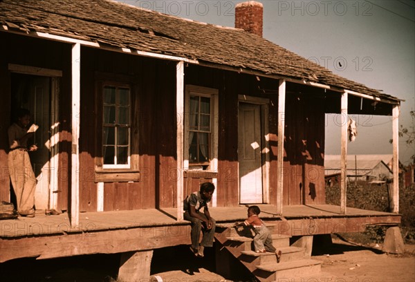 African American tenant's home beside the Mississippi River levee, 1940