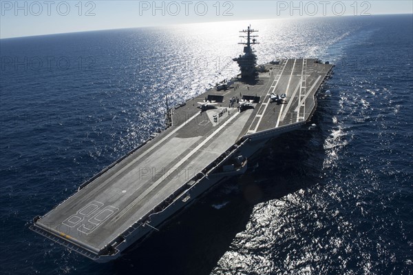 Two F-35C Lightning II carrier variant joint strike fighters conduct the first catapult launches aboard the aircraft carrier USS Nimitz (CVN 68).