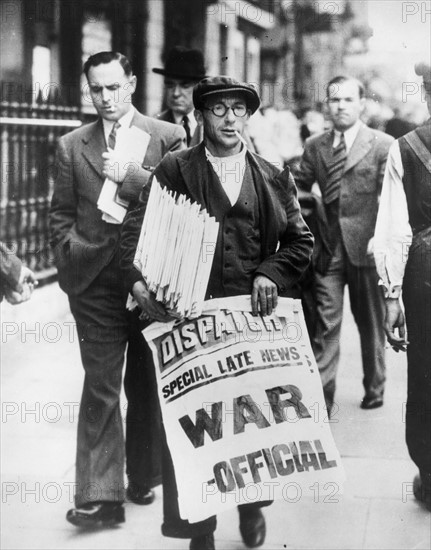 Newspaper seller in London with banner declaring the outbreak of World war two 1939
