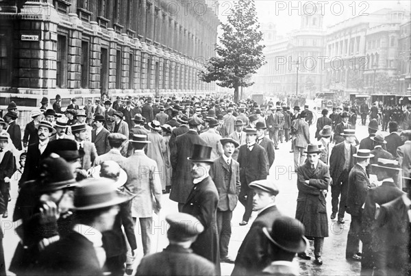 Announcement of World War One commencement as a crowd gathers near Downing St., London 1914