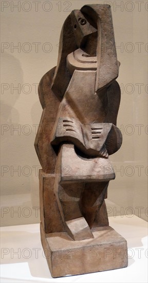 Sculpture titled 'Personnage assis lisant' by Jacques Lipchitz