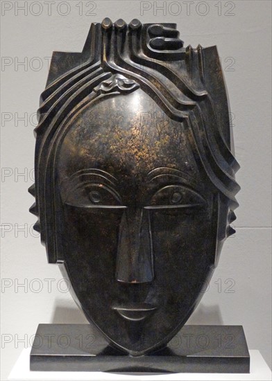 Bronze Grande Mask created by Gustave Miklos