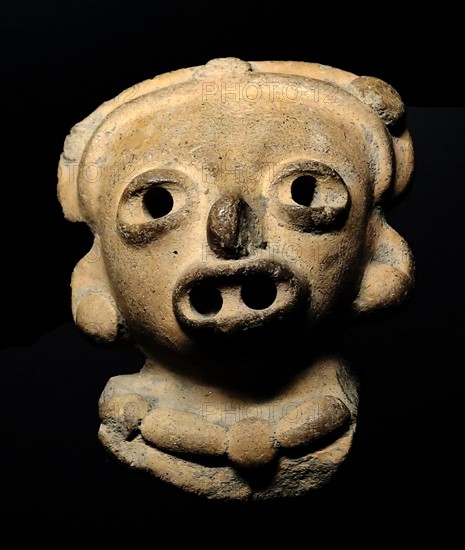 Olmec figurine, made from terracotta. From Mexico or Guatemala. 1500-600 BC