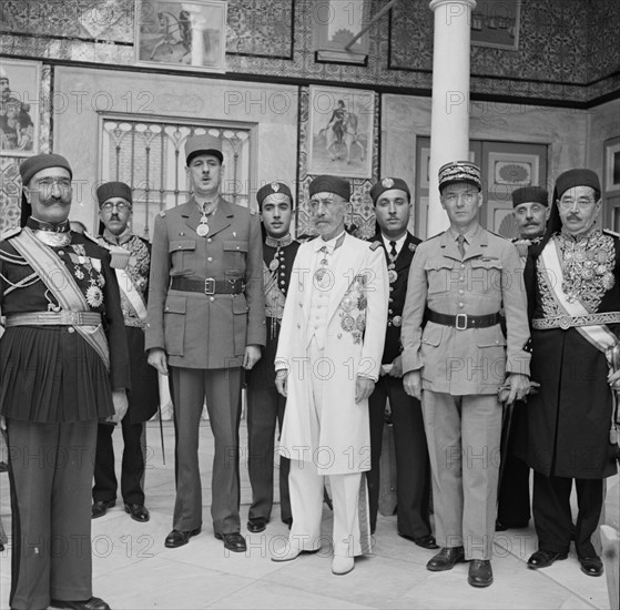 General Charles de Gaulle leader of the Free French forces consulting with the Bey of Tunis in 1943, Tunisia; world war two.