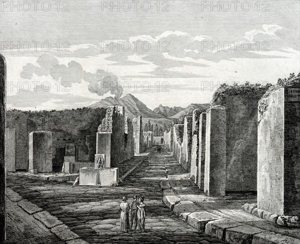 illustration showing tourists visiting the Roman ruins at Pompeii, in Italy, during their 'Grand Tour' of Europe. circa 1840