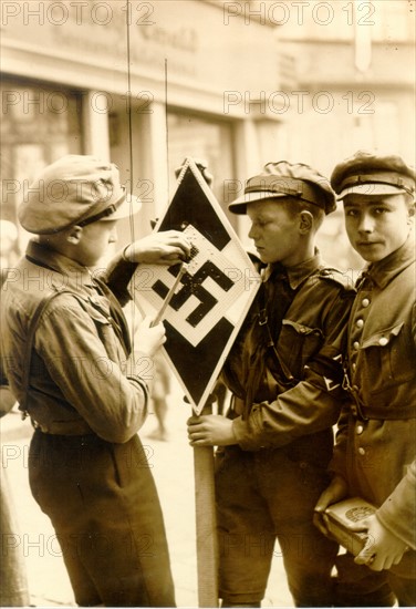 Three boys in the Hitler Youth.