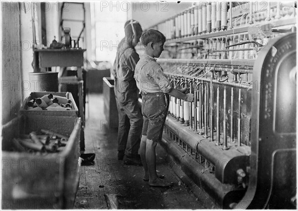 Doffers (Child labour) in a textile factory