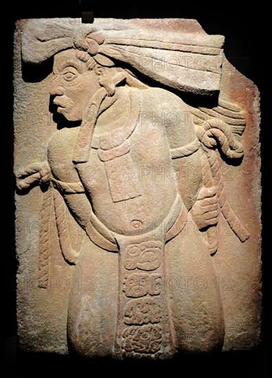 Mayan Stone relief depicting a prisoner.