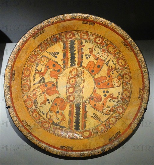 Mayan polychrome ceramic plate representing a group of seated figures; Mexico