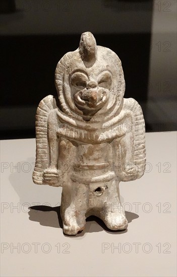 Zoomorphic or anthropomorphic Mayan figurine with human and owl features