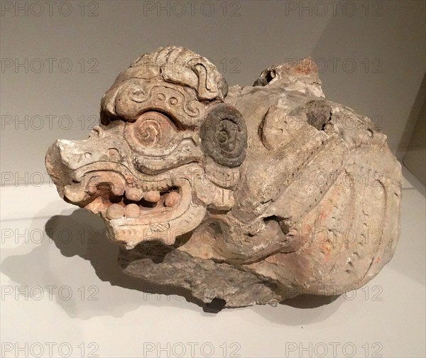 Mayan stucco fragment, depicting an insect from the underworld.