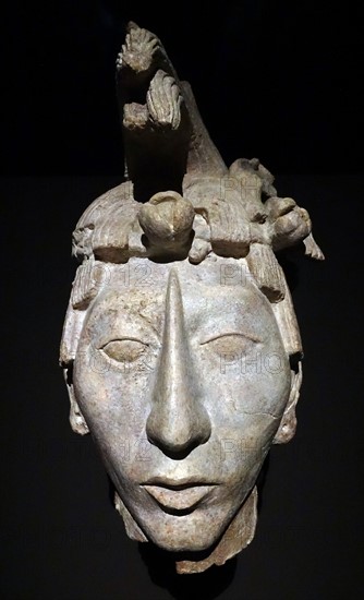 Mayan stucco head of a youth. From a funerary chamber