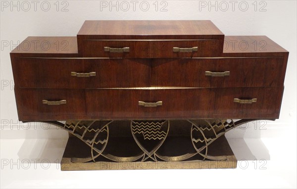 Commode with drawers set on a latticed bronze base, 1933, by Eugène Printz,