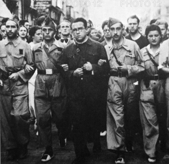 Santiago José Carrillo leads a militia march during the Spanish Civil War