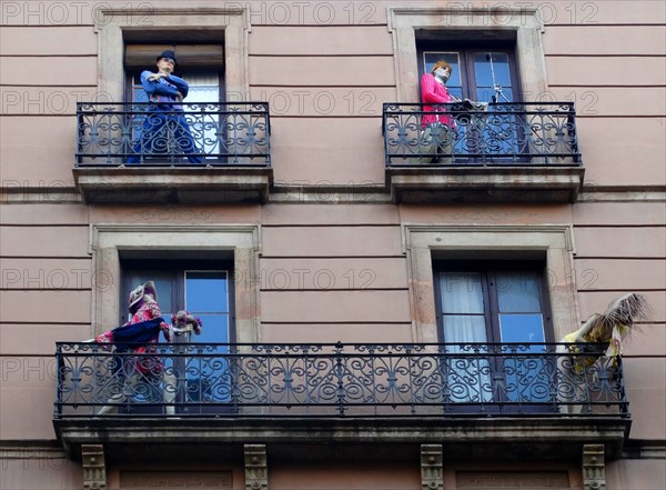 Façade of apartments with mannequins, Barcelona, Spain