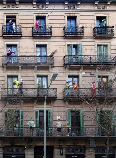 Façade of apartments with mannequins, Barcelona, Spain