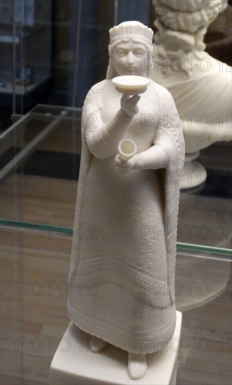 Assyrian-style reproduction in white porcelain