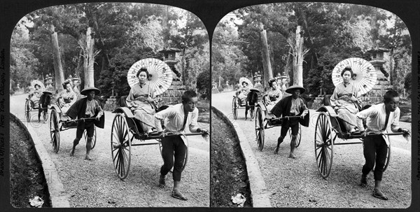 Geisha girls out for an airing in rickshaws - along the Old Avenue, Nara, Japan