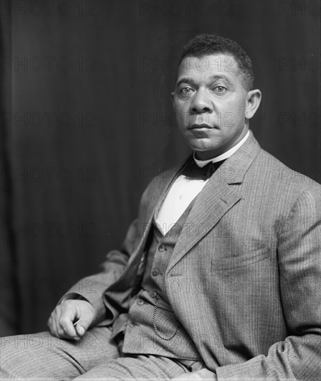 Booker T. Washington, half-length portrait, seated