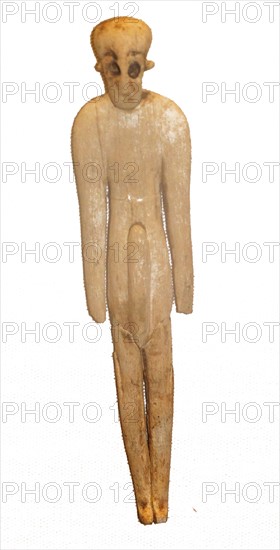 Ivory figure with hollow eyes and eyebrows from Ancient Egypt