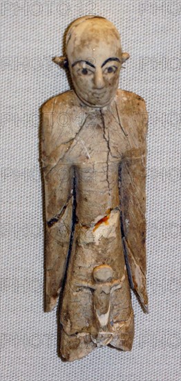 Ivory figure with hollow eyes and eyebrows from Ancient Egypt