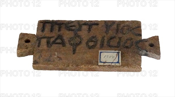 Egyptian wooden tag with Greek inscription