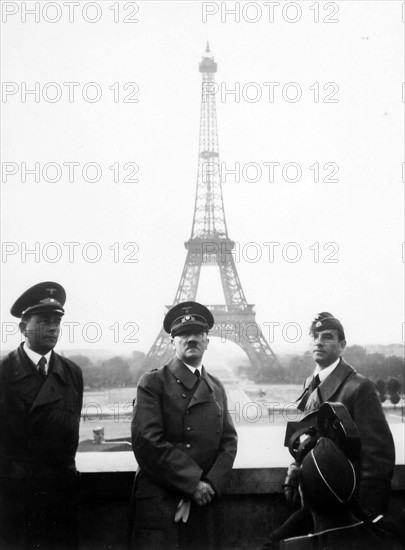 Photograph of Adolf Hitler in Paris, with the Eiffel Tower in the background