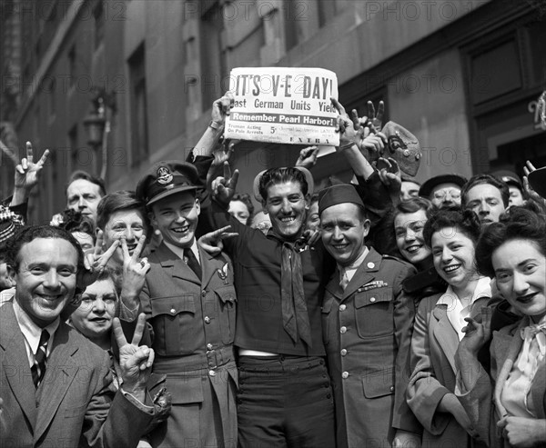 London May 1945. Crowd celebrates VE day marking the German surrender in World war two