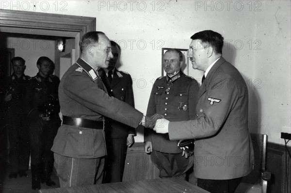 Adolf Hitler awards the Iron Cross to Lieutenant General Rainer Stahel