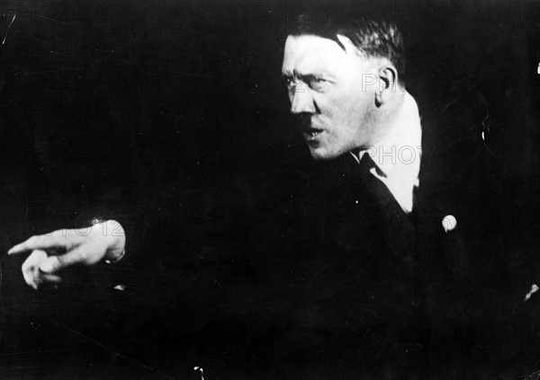 German Nazi leader Adolf Hitler, rehearsing a speech in front of the mirror 1933