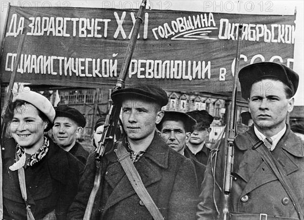 Photograph of Factory workers drilling with guns in their free time in the USSR