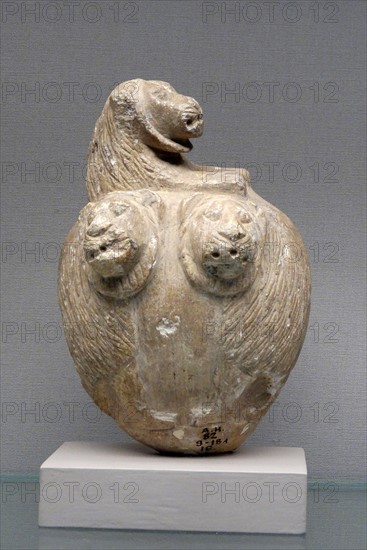 Stone mace head with lions