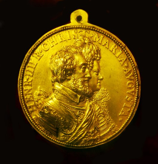 Coin depicting Henri IV of France by Guillaume Dupré