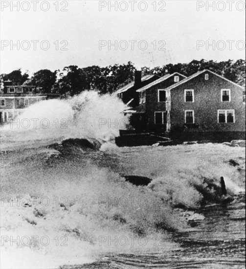 Hurricane Carol destroying beach front homes in Old Lyme