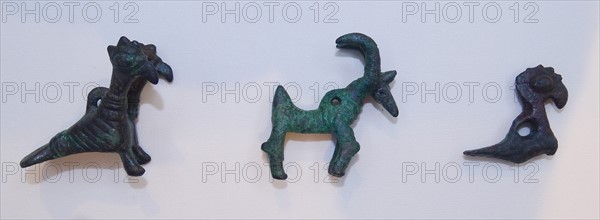 Pendants in the form of a goat